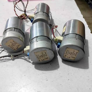 Nisca Servo DC Motor With Encoder NF5475E DC 24V To 38V And 3500 To 5000RPM - three cylindrical silver metal motors with attached wiring harnesses and white plastic connectors on a white surface.