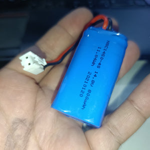 NSC145-4S 14.8V 800mAh Lithium Battery 5mm Pitch Connector (4S Li-ion Rechargeable With BMS) - a blue cylindrical battery pack with a white 2-pin connector, held in a hand.