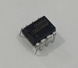 OB2338APL PWM Controller IC - a black, eight-pin dual in-line integrated circuit chip with 050054 and OB2338AP printed on its top surface.