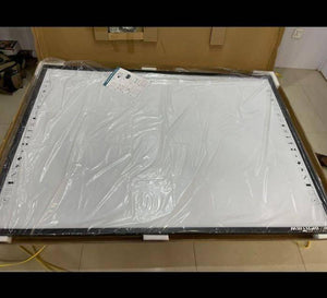 Optiview Interactive Whiteboard Touchable Display 82 Inch Size Working With Projector OPV-WB82 - a large rectangular white touch-sensitive display with black side control buttons, shown inside its box.