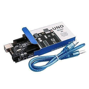 Original ELEGOO UNO R3 Board with USB Cable Compatible with Arduino IDE - partially inside its branded cardboard box with a blue USB cable coiled in the foreground.