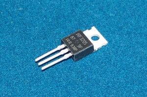 Original IRF3205 n Channel Power MOSFET - shown as a single black three-pin electronic component with a metal heat sink tab, resting on a textured blue surface.