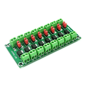 PC817 Optocoupler Isolation Board 2/4/8 Channel 3.6-30V Pakistan - a green circuit board with eight black optocouplers, red jumpers, and green screw terminal connectors.