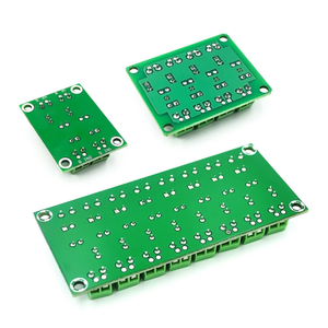 PC817 Optocoupler Isolation Board 2/4/8 Channel 3.6-30V Pakistan - three green printed circuit boards with screw terminal connectors on a white background.