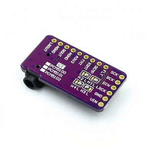 PCM5102A I2S DAC Decoder Module GY-PCM5102 – HiFi Audio Interface for Raspberry Pi & ESP32 - a purple rectangular circuit board with a 3.5mm audio jack, labeled pin headers, and three surface-mount jumpers.