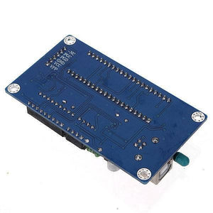 Pic K150 USB Pic Microcontroller Programmer - shown from the bottom, featuring a blue circuit board with visible pins, solder points, and a USB port.