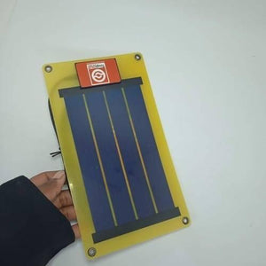 Portable 1W Mini Tough Stuff Solar Panel TSI 501 - a rectangular yellow panel with a blue solar cell array and a red logo label.