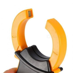Portable Handheld Digital Clamp Meter DT3266L AC DC Multimeter Voltage Current Resistance Tester - close-up view of the open yellow and black plastic current sensing jaws with visible metal contact points.