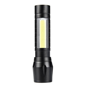 Portable Mini Telescopic Zoom Xpe COB LED Main Light White Light - a black cylindrical flashlight featuring a rectangular COB LED panel on its side.