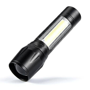 Portable Mini Telescopic Zoom Xpe COB LED Main Light White Light - a black, cylindrical flashlight featuring a front lens and a rectangular side-mounted COB light.