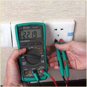 Proskit Autorange Digital Multimeter Mt 1232 For AC DC Voltage Current Resistance Temperature Measurement Tester - a green handheld unit with a digital display reading 221.9 AC and probes testing a wall outlet.