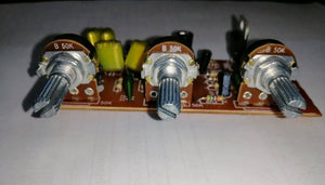 PT2399 Audio Mic Module - a brown circuit board featuring three B 50K potentiometers with silver knobs and various electronic components.