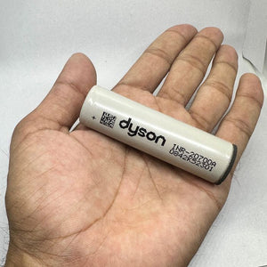 Pull-out Original Lithium Ion Cell 3.7V 3000mAh Li Ion Battery Cell INR-20700A - the cylindrical white body with Dyson branding.