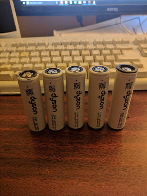 Pull-out Original Lithium Ion Cell 3.7V 3000mAh Li Ion Battery Cell INR-20700A - five cylindrical white Dyson INR-20700A batteries standing upright.