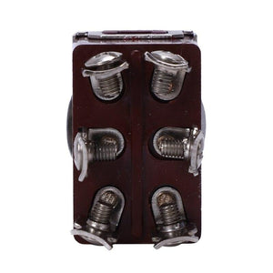Push Switch Dpdt Toggle Switch - a close-up of the brown rectangular base with six metal screw terminals arranged in two vertical columns.