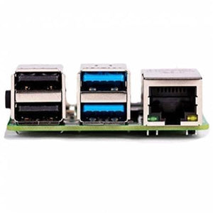 Raspberry Pi 4 4GB RAM - a close-up side view of two black USB ports, two blue USB 3.0 ports, and an Ethernet port on a green circuit board.