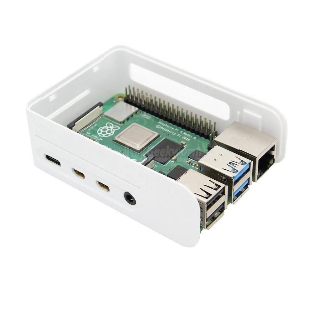 Raspberry Pi 4 Case With Fan Fitting Raspberry Pi 4 Casing Cover - a white plastic enclosure housing a green Raspberry Pi 4 circuit board.