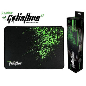 Razer Goliathus Gaming Mouse Mat Pad-large 1 Feet 1-5 Inches - shown as a rectangular black mat with green graphics alongside its vertical retail packaging box.
