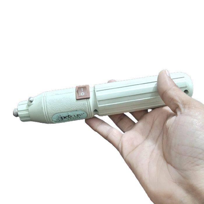 Rechargeable Drill Machine 5V DC Powered Mini Hand Held Used Condition - a beige handheld drill with a power switch, held in a person's hand.