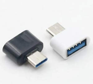 Remax OTG Type c OTG For Android Type For All Android USB Converter For Smartphones - one black and one white USB-C to USB-A adapter connector, each with a male USB-C plug and a female USB-A port.