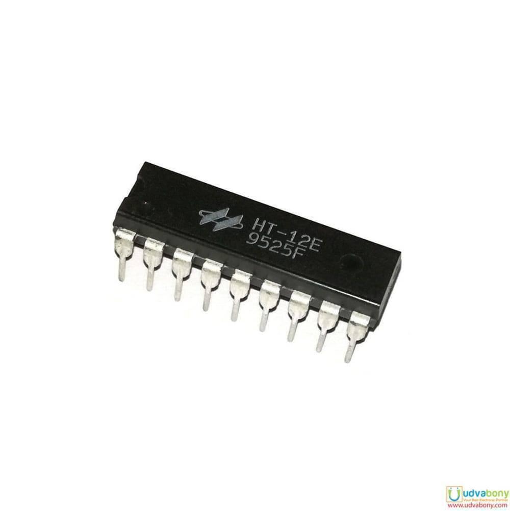 RF Encoder IC HT12E 18 DIP - a black, rectangular 18-pin integrated circuit chip with white text printed on its top surface.