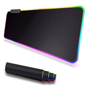 RGB Luminous Gaming Mouse Pad - shown as a large rectangular black mat with rainbow LED edges and a top-left control button, plus a rolled-up version.