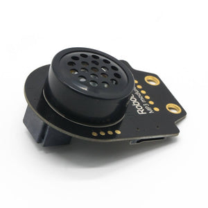 Robobloq MP3 Module With RJ11 Connecting Wire - a black circular speaker mounted on a black circuit board with a side-facing connector port and gold contact pads.