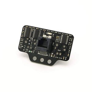 Robobloq Ultrasonic Sensor With RJ11 Connecting Wire - a black rectangular circuit board with a central RJ11 port, surface-mounted components, and three circular mounting holes.