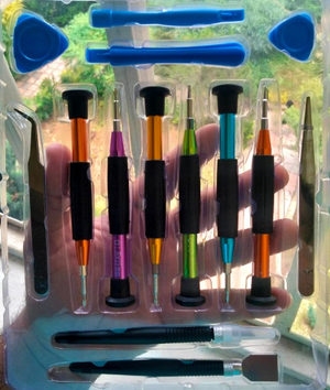 Screwpro 1688 Multimaster Screwdriver Kit - shown in a plastic tray containing six colourful precision screwdrivers, two tweezers, and four pry tools.