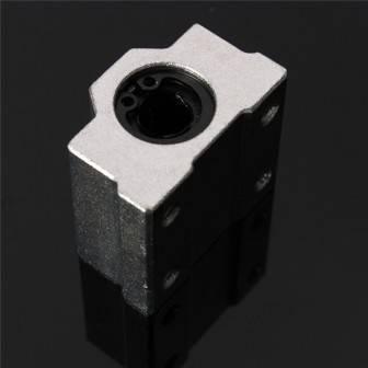Scs8uu 8mm Linear Motion Ball Bearing Machinery Slide Bushing CNC - a silver and black rectangular metal slide bushing with a circular opening, shown in a close-up product view.