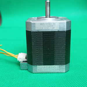 Shinano Kenshi STP-42D4042 2A 1.8 Degree Per Step 0.53nm Stepper Motor - a silver and black cylindrical unit with a metal shaft, featuring a white connector with yellow wires on a green background.