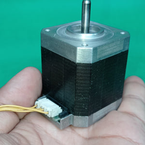 Shinano Kenshi STP-42D4042 2A 1.8 Degree Per Step 0.53nm Stepper Motor - its black square body, silver top plate with a metal shaft, and a white connector port.