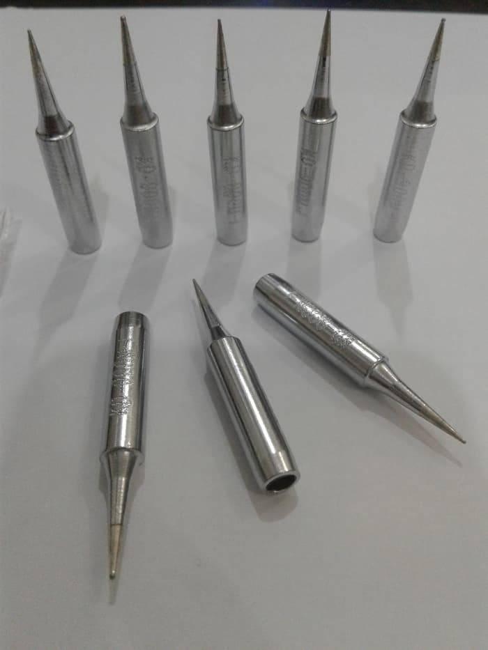 Soldering Iron Bit Kd-m-i - shown as a collection of seven silver-colored, pointed metal soldering tips arranged on a white surface.