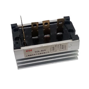 SQL-80A THREE PHASE BRIDGE - a silver metallic rectifier with a black top, four vertical metal terminals, and a label showing a circuit diagram.