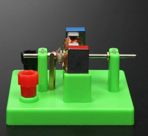STEM DIY DC Electrical Motor Model - Physics Experiment Learning Toy - a green plastic base with a copper-wound coil, a red and black magnet, and a red terminal connector.