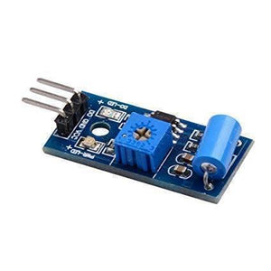 Sw-420 Vibration Sensor - a blue rectangular potentiometer, a blue cylindrical sensor, and a three-pin header on a blue circuit board.