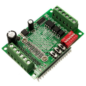 TB6560 Single Axis 3A Stepper Motor Driver - a green circuit board with screw terminals, a red six-position DIP switch, and three slide switches.