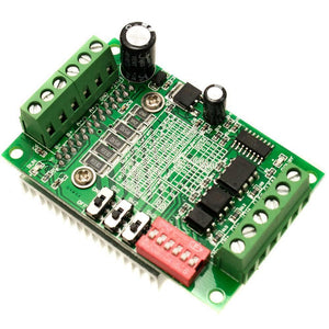 TB6560 Single Axis 3A Stepper Motor Driver - a green circuit board with screw terminals, a red DIP switch array, and a printed settings table.
