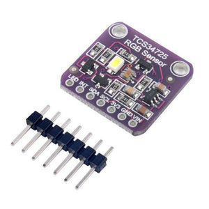 TCS34725 Color Sensor module - a purple circuit board with an LED, sensor, and seven pin headers, accompanied by a separate row of header pins.
