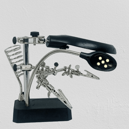TE 800 Magnifying Glass 5 LED Auxiliary Clip Magnifier 3 In 1 Hand Soldering Solder Iron Stand Holder Station - a black base, a silver soldering iron stand, two alligator clips, and an LED lamp.