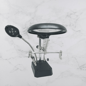 TE 800 Magnifying Glass 5 LED Auxiliary Clip Magnifier 3 In 1 Hand Soldering Solder Iron Stand Holder Station - a black base, a magnifying lens, two alligator clips, a soldering iron holder, and an LED lamp.