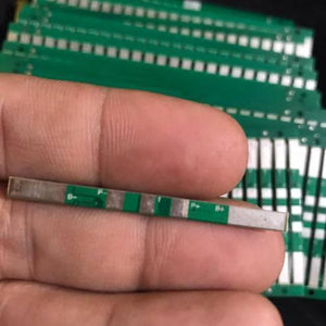 Temperature Sensor Thermistor 1s 3.7V 5A Li-ion BMS Pcm Battery Protection Board Pcm For 18650 Lithium Ion Li Polymer Battery - a close-up of a thin, green rectangular circuit board held in fingers.