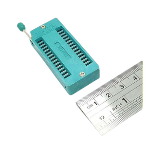 Textool 28 Pin 228-3345 ZIF ZIP DIP IC tester board - a teal rectangular component with a lever and metal ruler for scale.
