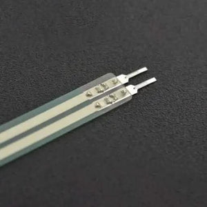 Thin Film Pressure Sensor FSR RP-C7.6-LT-LF2 Flexible High Sensitivity 30G to 8KG - a close-up of the flat, flexible sensor strip showing the two silver electrical connector pins at the end.