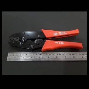 Tni-u TU-03B Cable Crimper Crimping Tool - shown in black and orange with a metal ruler placed below it for scale.