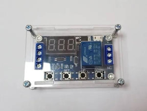 Transparent Acrylic Case For Timer Relay Module - a blue circuit board with a digital display, a blue relay, four buttons, and screw terminals.