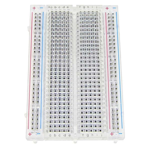 Transparent Clear Breadboard 400 Tie-Points with 2 Sets of Power Rails - a top-down view of the clear plastic board with numbered and lettered rows.