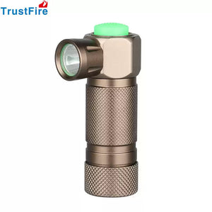 TrustFire Z1 Flashlight Cree XP-E 280 lumens 1XCR123A/16340 - a compact bronze-coloured right-angle torch with a textured metal body and a prominent green power button on top.