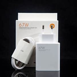 Type-C Mi 67W Power Adapter suit - a white power adapter and a coiled USB cable in front of its white product packaging box.
