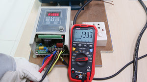 UNI-T UT161E True RMS Digital Multimeter – 22000 Count, AC/DC 1000V, 20A, High Accuracy 0.05%, 220MHz Frequency, Temperature, NCV, USB, CAT III 1000V - a frequency reading of 133.3 Hz on its display while connected to a DFL-3000A controller.